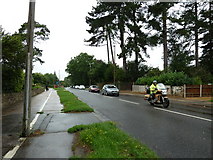 TQ1630 : Motorcyclist in Guildford Road by Basher Eyre