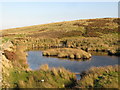 NY7458 : Reservoir above the lime kiln on Agarshill Fell (3) by Mike Quinn