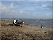 SZ1891 : Lone boat - Mudeford beach by Mr Ignavy