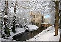 SP6214 : Boarstall Tower and the moat in the snow by Rob Dixon