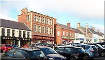 J3436 : Shops in Main Street, Castlewellan by Eric Jones