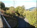 Sharp bend in B4246 next to an arch bridge