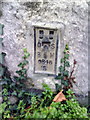 Benchmark bracket on the Church of St Helen and St Giles