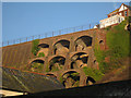 Retaining wall and arches