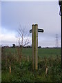 Footpath sign to the B1078 Ash Road & Mill Lane