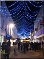 Christmas late night shopping in Market Street Falmouth