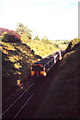 An Exeter bound Diesel Railcar approaches Topsham in late evening shadows