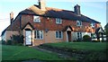 Row of tilehung cottages, B2087