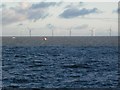 Twrbeini gwynt dan gysgod cymylau / Wind turbines under cloud shadows