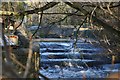 The weir on the river Caen just below Dean