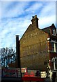 Faded painted advertisement, Tottenham High Road