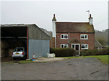 TQ3517 : Cottage, Dean's Farm by Robin Webster
