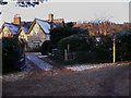 House by footpath on Empshott Green