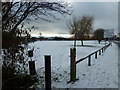 Looking from the Eastern Road onto a snowy recreation ground