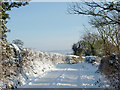 SO8995 : Snow covered lane on Colton Hills, Staffordshire by Roger  D Kidd