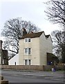 Weather-boarded house by Morden Hall Park