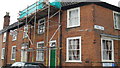 Scaffolding on a house near the junction of London Road and Steeple End