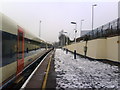 Train for Weymouth at a snowy Branksome Station