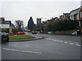 Heol Isaf/Kings Road junction, with War Memorial and Christ Church