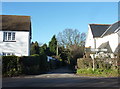 The lane to Luddenham, viewed from its junction with Bysing Wood Road