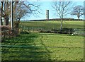 Domed hill  with the Toat monument at its pinnacle