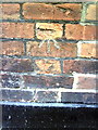 Benchmark on Ashley Cottage, Church Street