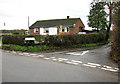 Bungalow by junction of Mill Lane and Woodrow Lane