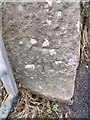 Benchmark on gatepost on the B5110, Llangefni