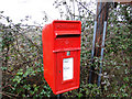 Close up of the postbox ( IP21 7127) on Rattlerow Hill