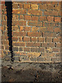 Bench mark on a bridge wall in Wrexham Road