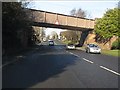 SJ7666 : Railway overbridge, A50 at Holmes Chapel by Peter Whatley