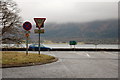 A main road, a lake and a misty fellside