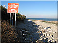 Beach with warning