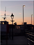 SZ0090 : Poole: lampposts on the quay by Chris Downer