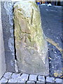 Benchmark on guardstone on north side of Black Swan Lane at junction with Fargate