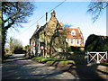 Heading north on The Street, Foulsham