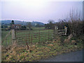 Stile and gate in the early evening