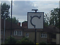 Unusual roundabout sign, Myddelton Avenue