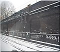 Wall by the West Coast Mainline approaching Euston Station