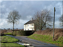 SU9914 : Corner cottage, Bignor by Robin Webster