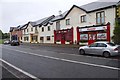 N0590 : New shops & houses, Main Street by P L Chadwick