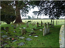 SU4739 : Holy Trinity, Wonston: graves in the churchyard by Basher Eyre