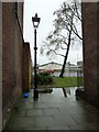 Looking from Old Commercial Road through to the main road