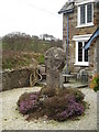 Medieval cross in the garden of Cross Cottage