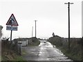 J3012 : The lower end of Derryoge Road by Eric Jones