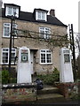 Uley: disused petrol pumps