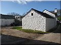 SS4287 : Newly whitewashed farm buildings in Pitton by Jeremy Bolwell