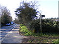 TM2750 : A1152 Woods Lane & bridleway to Valley Farm Road by Geographer