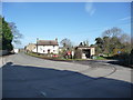 Bus stop and departing bus, Newton-le-Willows