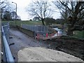 Road widening and new footbridge under construction over the River Dove